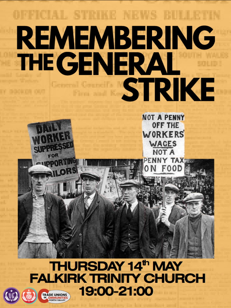 A group of working men march with placards during the 1926 UK general strike
